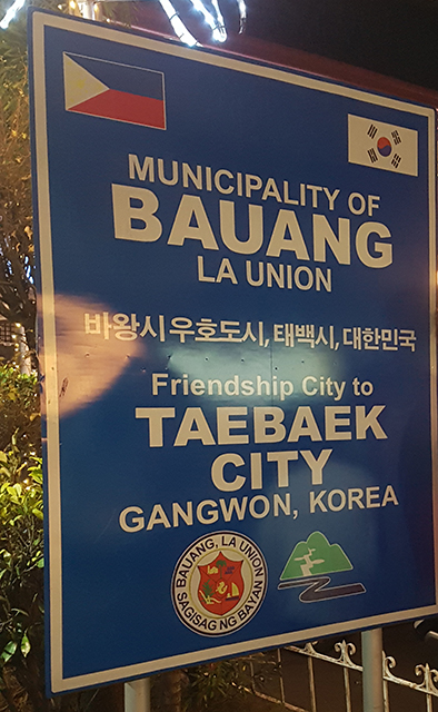 ▲필리핀 바왕시에 설치된 우호도시 태백시 안내 간판. ⓒ태백시